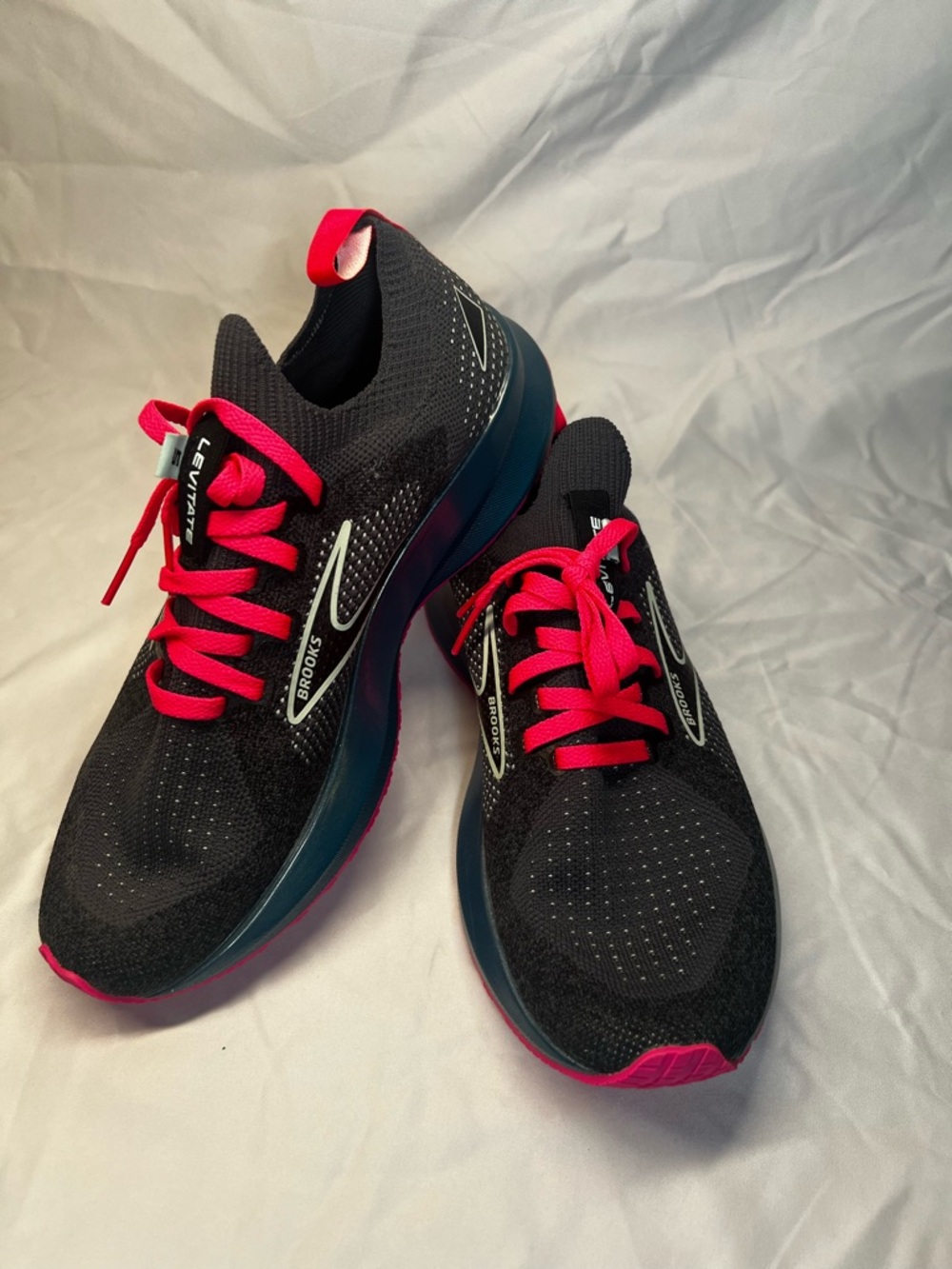 Brooks Running Sneakers in Black with Bright Pink and Teal blue bottom Accents